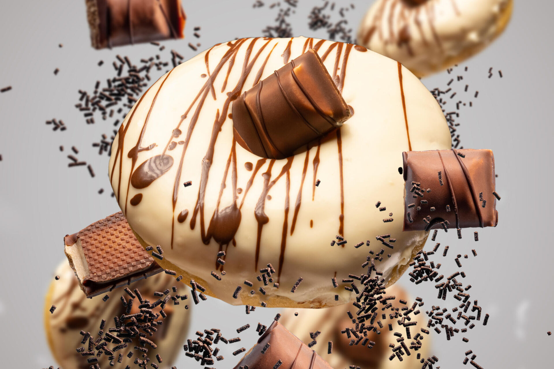 flying-donuts-concept-donuts-with-white-chocolate-glaze-chocolate