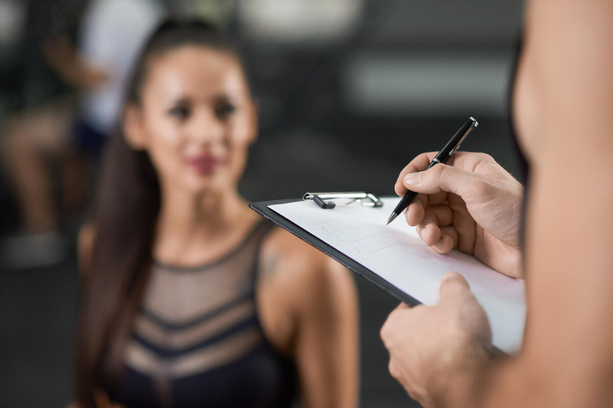 crop-closeup-portrait-woman-exercising-gym