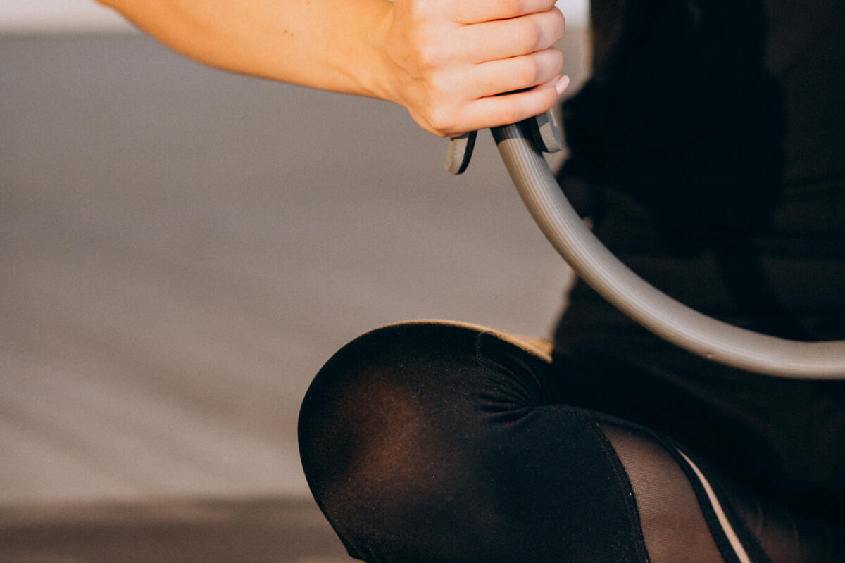 woman-practicing-yoga-pilates