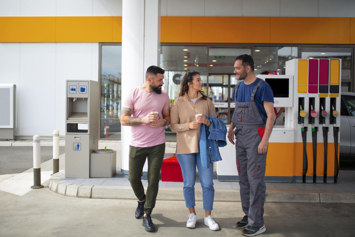 people-spending-time-gas-station