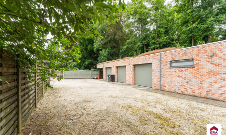 Handelspand met woonst op 1.150 m² in centrum Aarsele!  image