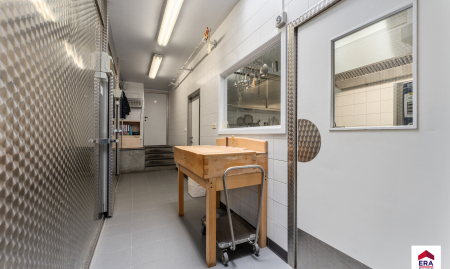 Handelspand met woonst op 1.150 m² in centrum Aarsele!  image